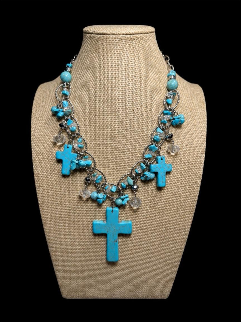 TURQUOISE COLORED CROSS NECKLACE