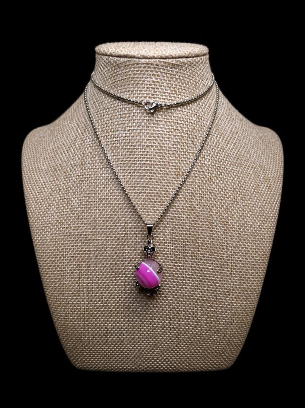 SKELETON ON PINK GLASS SWIRL BALL NECKLACE
