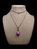 SKELETON ON PINK GLASS SWIRL BALL NECKLACE
