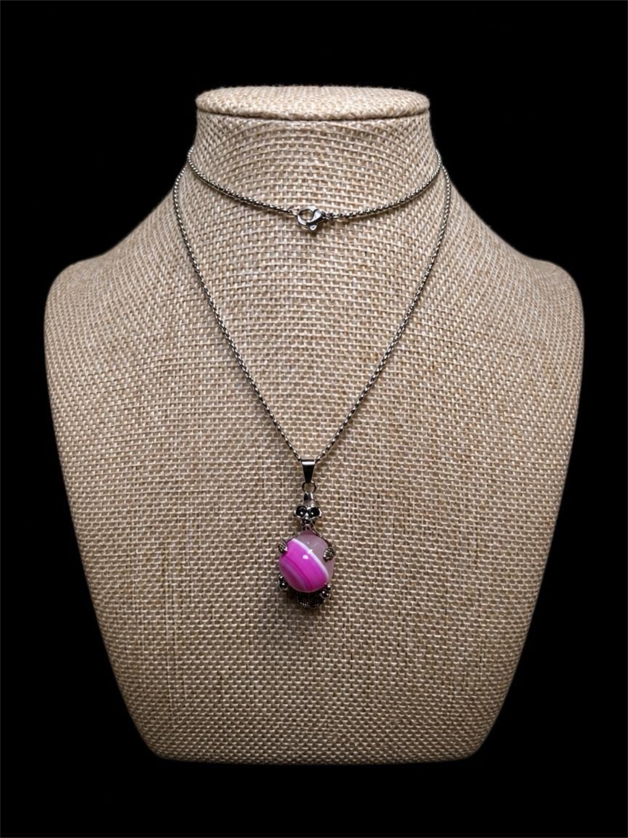 SKELETON ON PINK GLASS SWIRL BALL NECKLACE