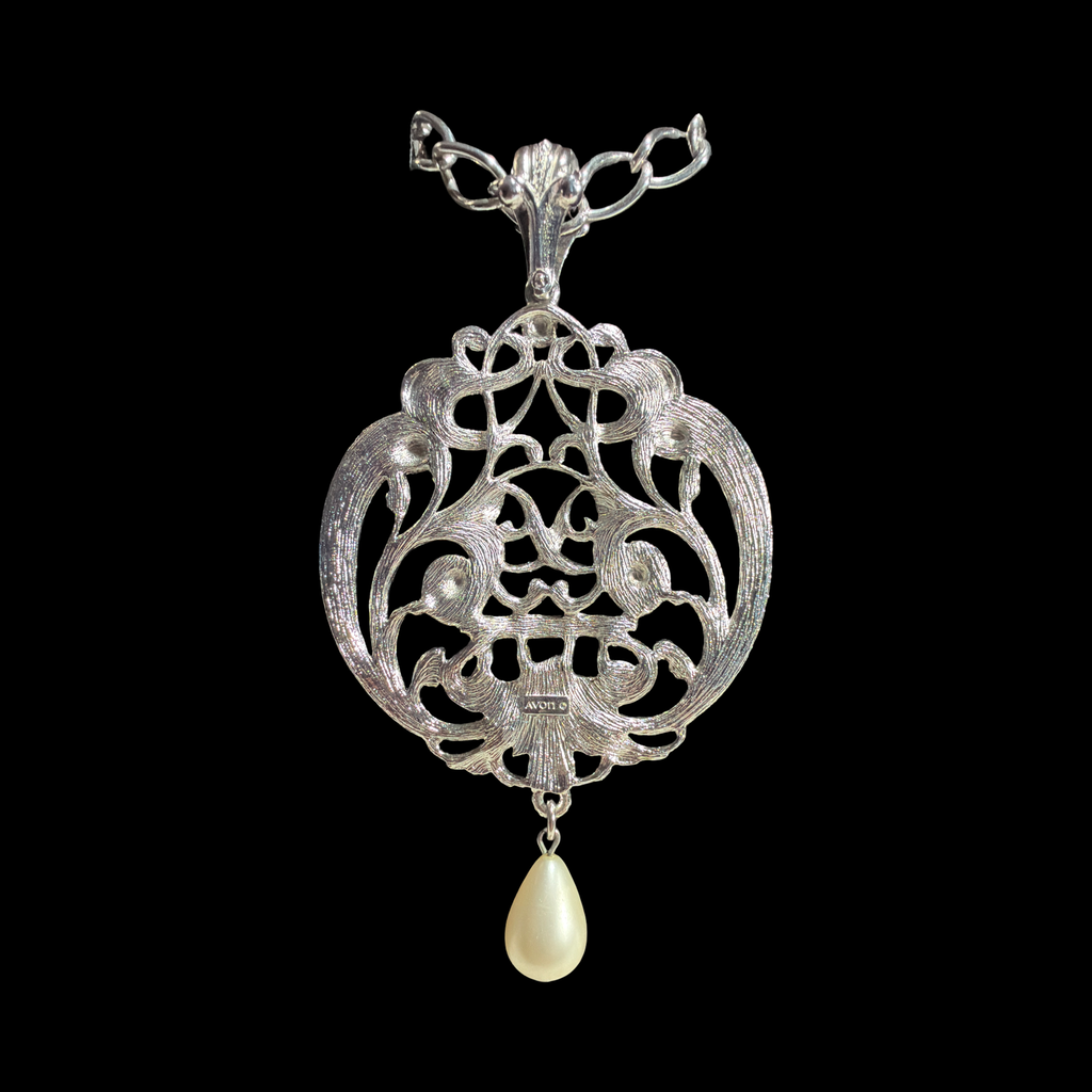 AVON MAGNIFICENT MEDALLION