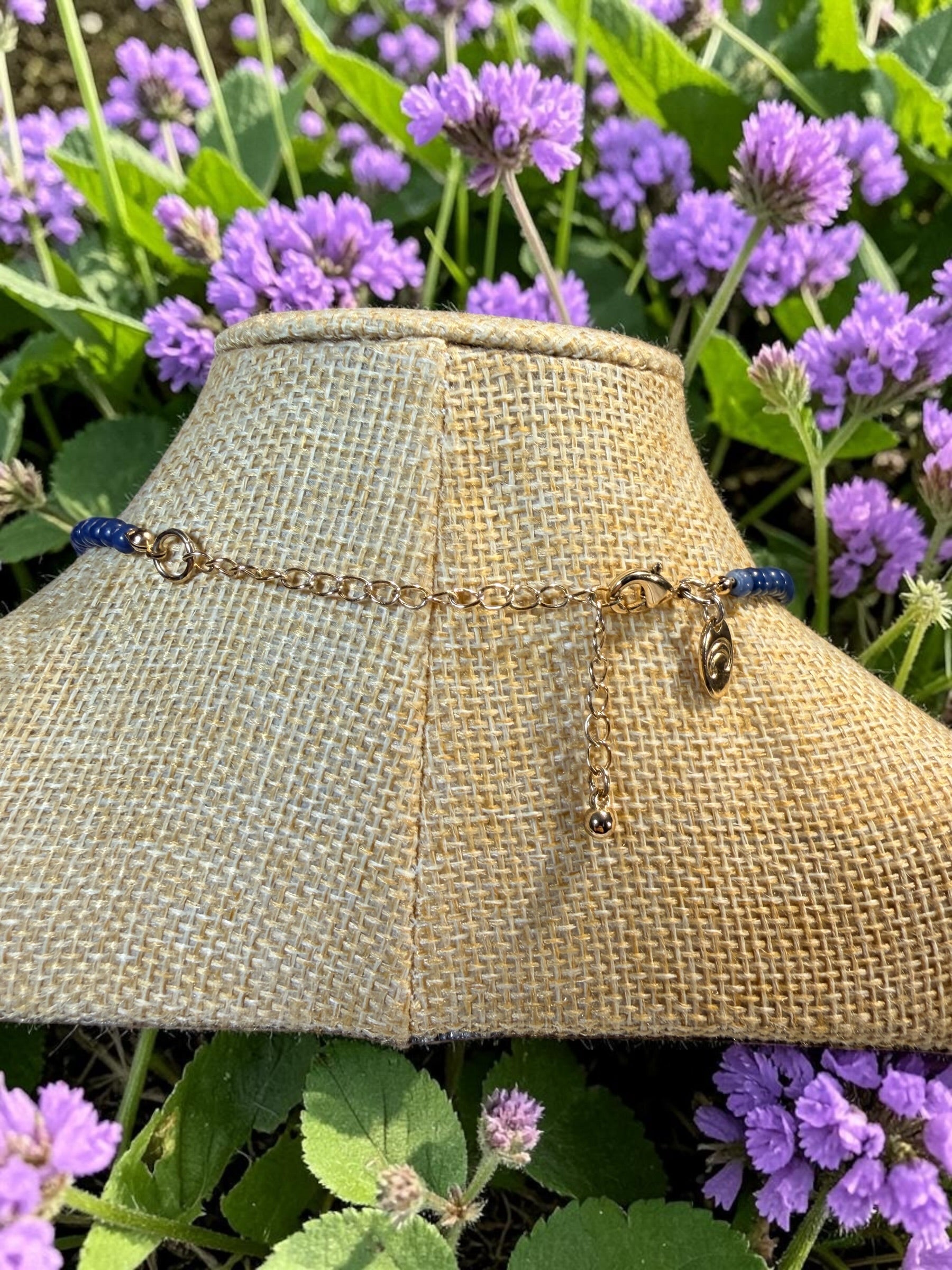 CHARMING CHARLIE, BLUE METAL FLORAL NECKLACE