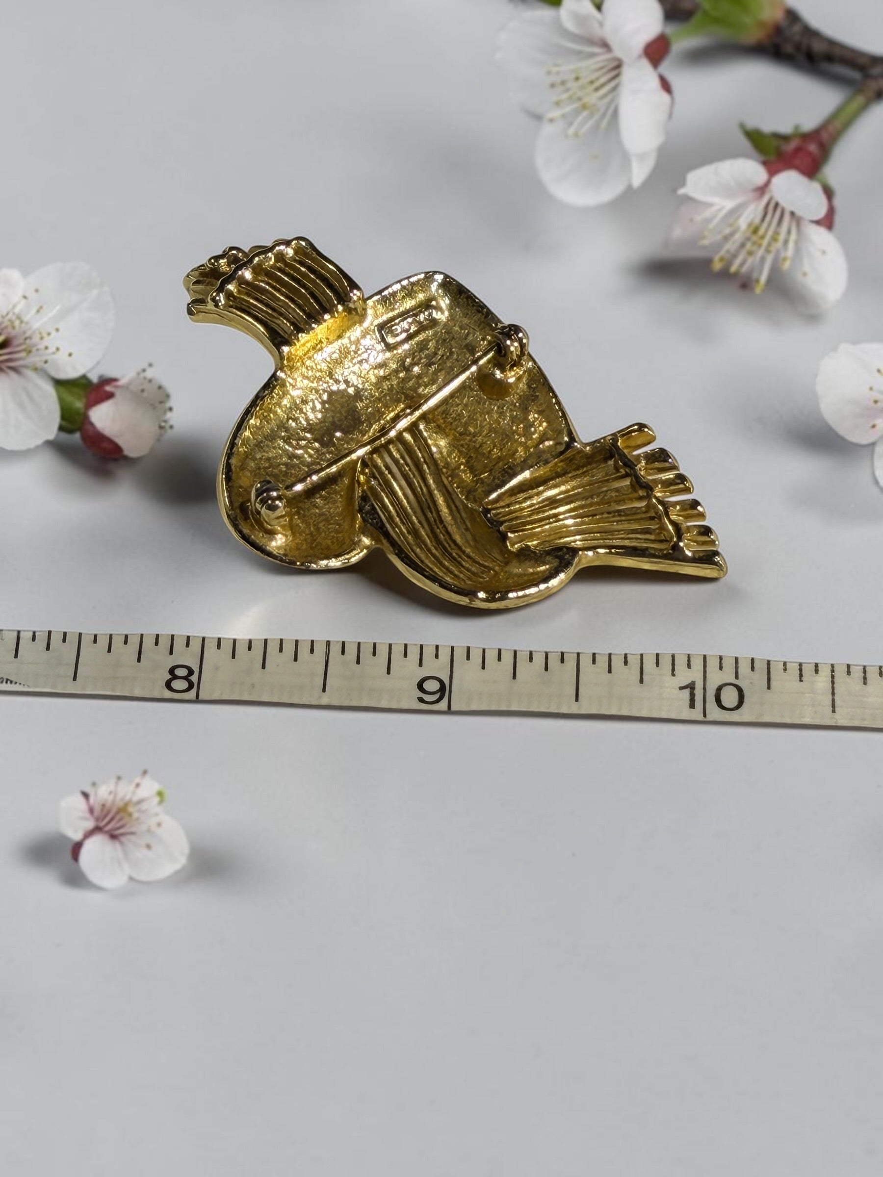 A.J.C. GOLD TONE FLYING HEART BROOCH