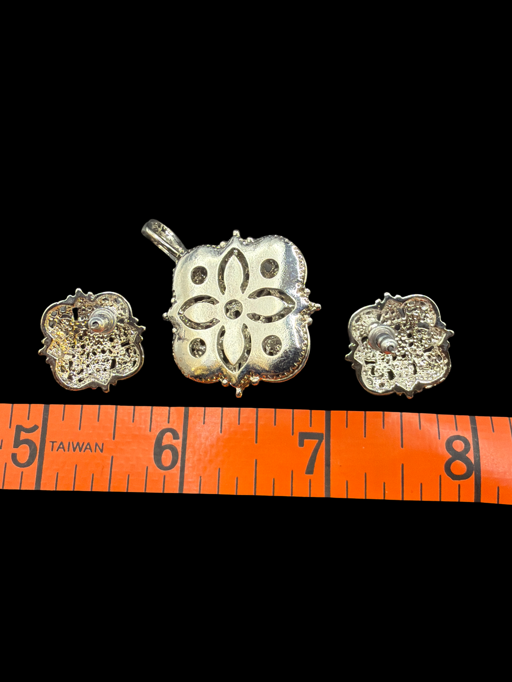 SILVER TONE AND RED RHINESTONE PENDANT AND EARRINGS SET