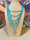 TURQUOISE COLORED SEED BEAD NECKLACE WITH CROSS PENDANT