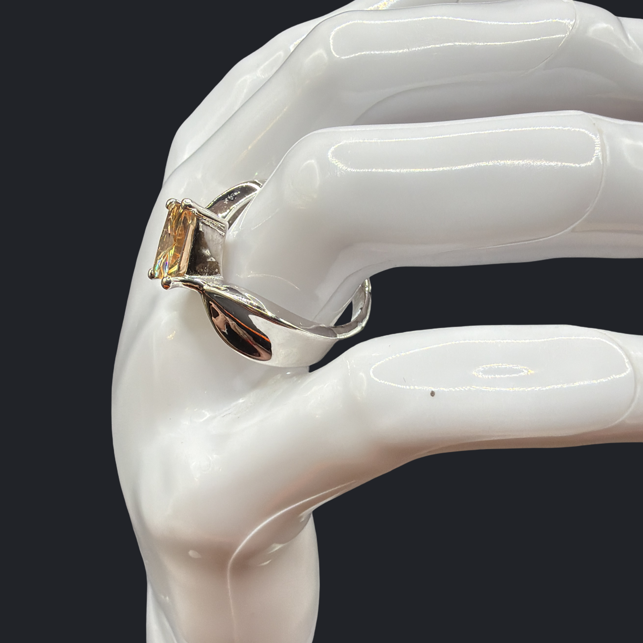 SQUARE CUT ORANGE COLORED STONE