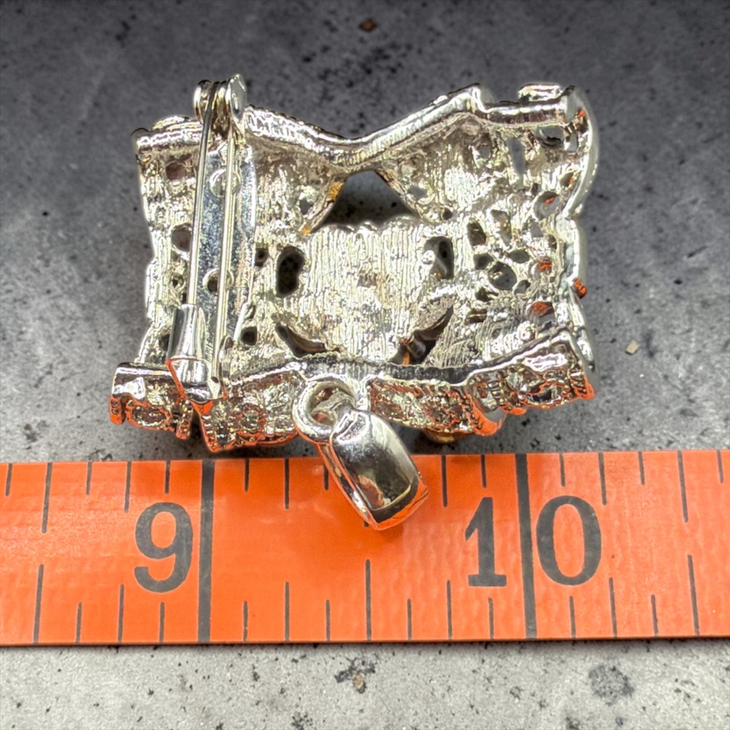 COLORED STONE BOW BROOCH OR PENDANT