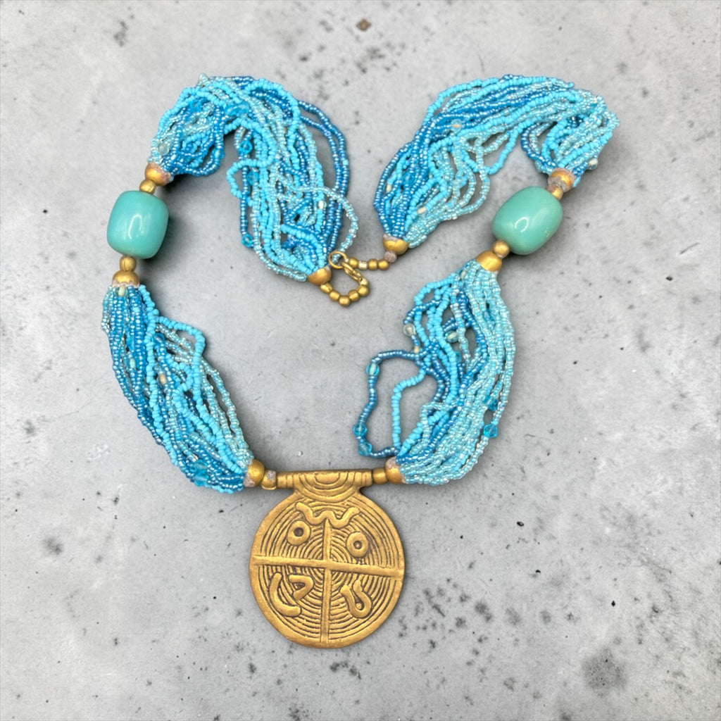 BLUE BEADS AND BRONZE TONE NECKLACE